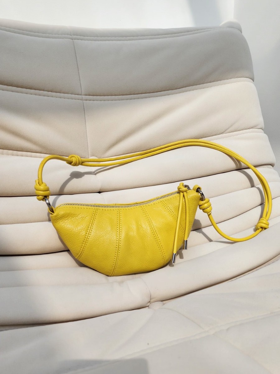 レディース向け、斬新なデザインのシープスキン製ホーンオードバ - Women Bags Designer のレビューと価格